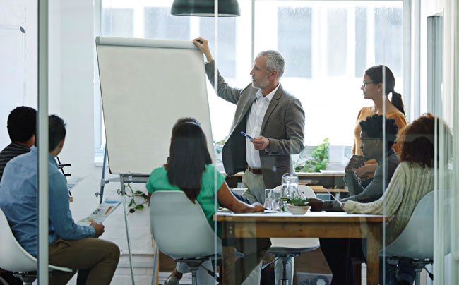 Work Team Brainstorming with a Large Notepad